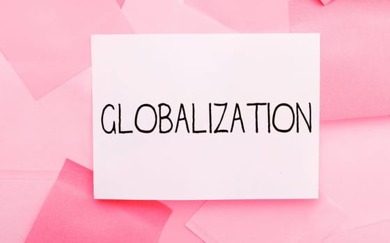 Sign displaying Globalization, Word for development of an increasingly integrated global economy marked