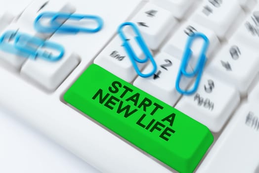 Hand writing sign Start A New Life, Word for be reckoned from a particular point in time to begin doing something