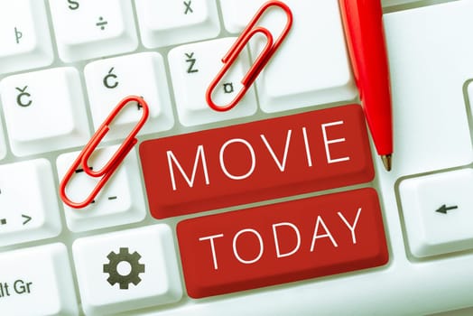 Sign displaying Movie, Business overview Cinema or television film Motion picture Video displayed on screen