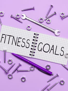 Text showing inspiration Fitness Goals, Internet Concept Loose fat Build muscle Getting stronger Conditioning