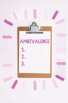 Hand writing sign Ambivalence, Business idea attitudes or feelings attraction and repulsion to an object person or action