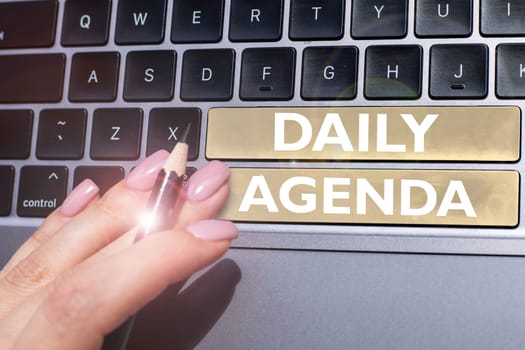 Sign displaying Daily Agenda, Word Written on To do list of items be discussed daily or at formal important meeting