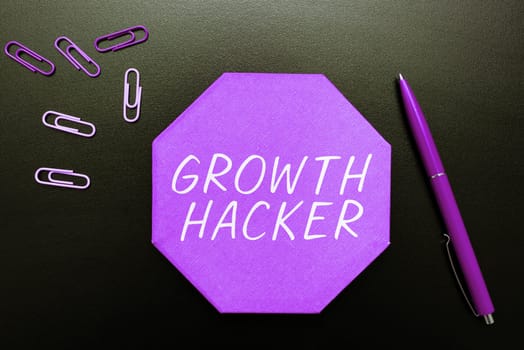 Writing displaying text Growth Hacker, Business concept generally to acquire as many users or customers as possible