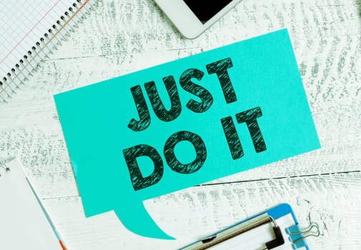 Writing displaying text Just Do It, Business concept Motivation for starting doing something Have discipline