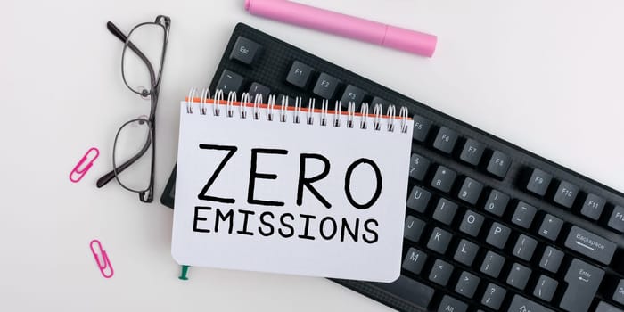Text caption presenting Zero Emissions, Conceptual photo emits no waste products that pollute the environment