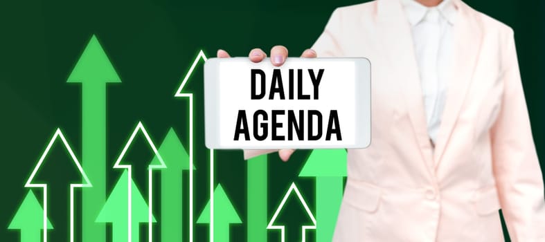 Sign displaying Daily Agenda, Word Written on To do list of items be discussed daily or at formal important meeting