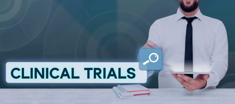 Writing displaying text Clinical Trials, Business overview Research investigation to new treatments to people