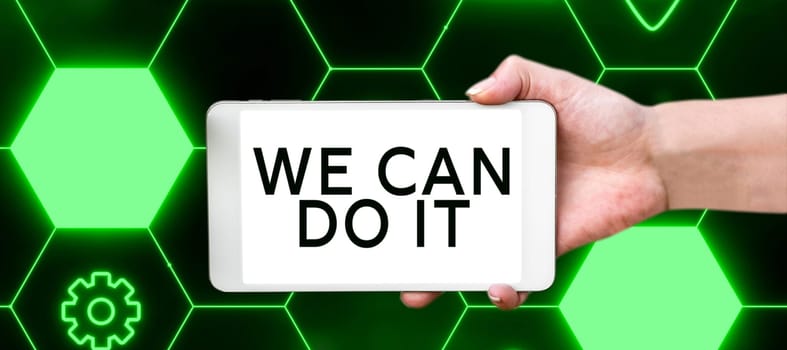 Sign displaying We Can Do It, Word for see yourself as powerful capable person