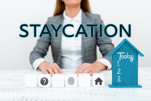 Conceptual display Staycation, Business overview a vacation spent at one's home enjoying all that home environment
