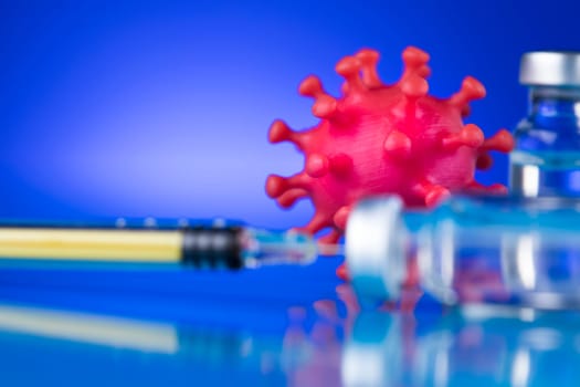 Close up medical syringe with a vaccine