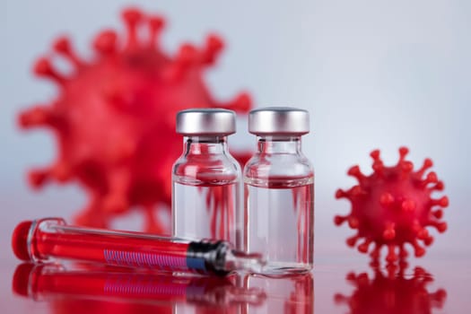 Close up medical syringe with a vaccine