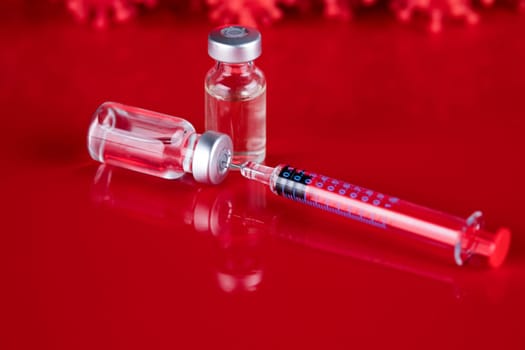 Close up medical syringe with a vaccine