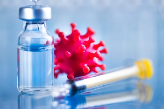 Close up medical syringe with a vaccine