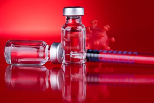 Close up medical syringe with a vaccine