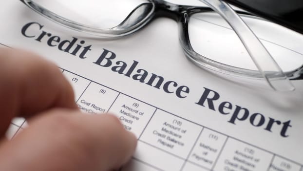 Finger tapping on credit balance report
