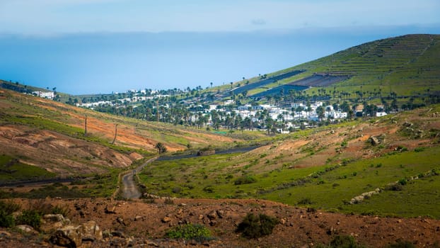 View on Haria on Lanzarote and the valley of the thousand palms. Travel and tourism on the Canary Islands.