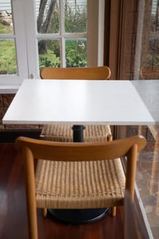 Room interior coffee shop with comfortable furniture, stock photo