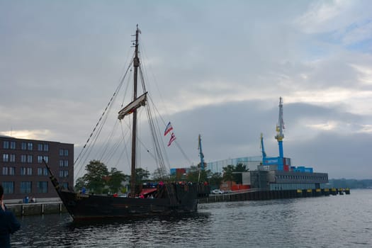 Wismar, Germany, September 10, 2022 - seaport and a Viking excursion ship in the historic Hanseatic city of Wismar, on the Baltic Sea coast Mecklenburg -Western Pomerania in Germany