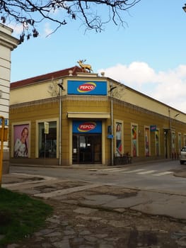 Sremska Mitrovica, Serbia, March 16 2023 A signboard with a name and logo of network stores Pepco above an entrance to a shop. Pepko banner. Women's shop with economical prices. Pepco chain in Serbia.