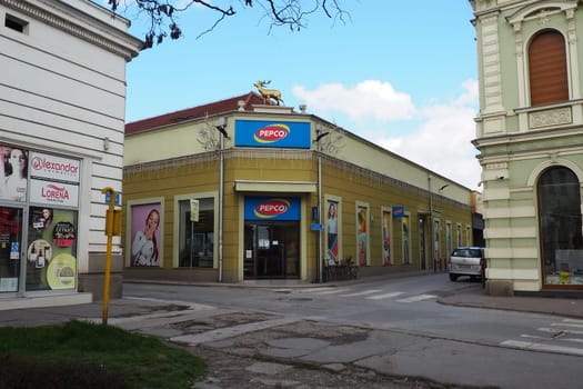 Sremska Mitrovica, Serbia, March 16 2023 A signboard with a name and logo of network stores Pepco above an entrance to a shop. Pepko banner. Women's shop with economical prices. Pepco chain in Serbia.