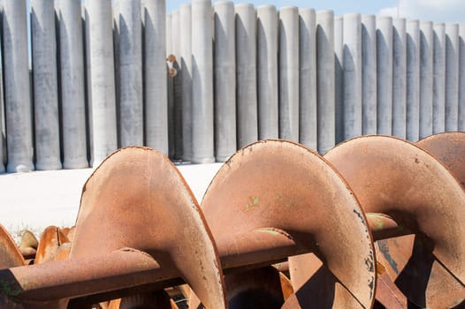 Augers for drilling of the ground for laying drain pipes