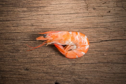 steamed shrimps on wood background