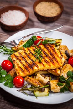 Halloumi grilled cheese on mushrooms and vegetables