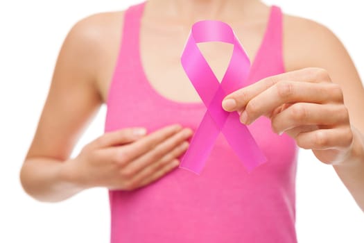 Woman with a pink breast cancer awareness ribbon