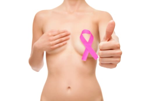 Woman with a pink breast cancer awareness ribbon