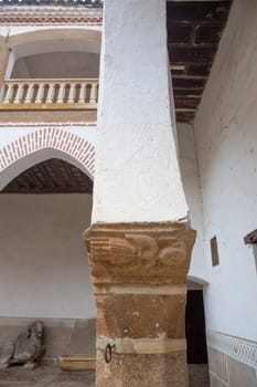 Abadia, Spain - March 5th, 2023: Sotofermoso Palace Mudejar-style courtyard. Arch detail, Abadia, Caceres, Spain