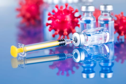 Close up medical syringe with a vaccine