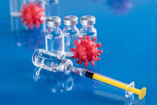 Close up medical syringe with a vaccine