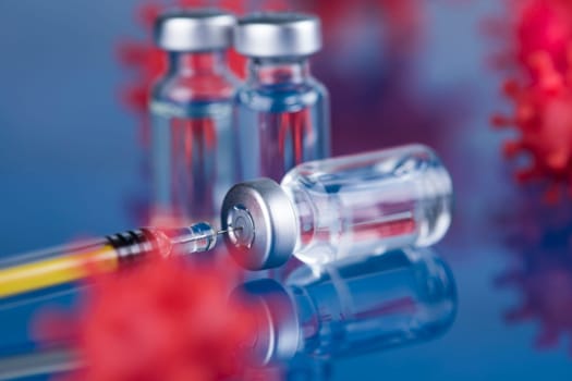 Close up medical syringe with a vaccine
