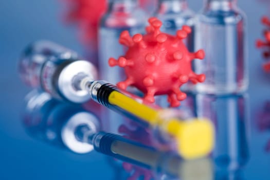 Close up medical syringe with a vaccine