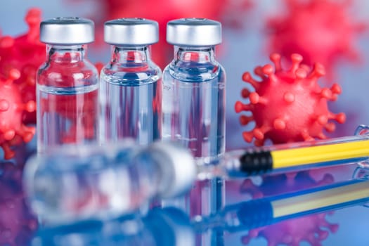 Close up medical syringe with a vaccine