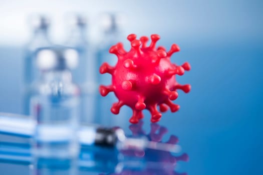 Close up medical syringe with a vaccine