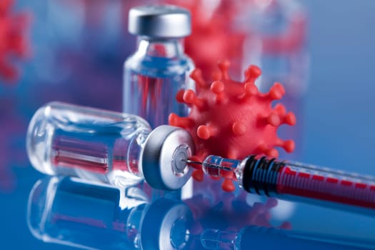 Close up medical syringe with a vaccine