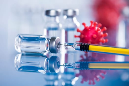 Close up medical syringe with a vaccine