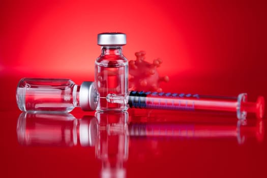 Close up medical syringe with a vaccine
