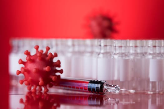 Close up medical syringe with a vaccine
