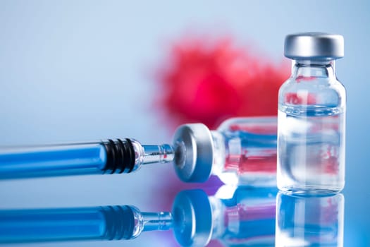Close up medical syringe with a vaccine