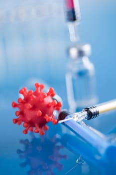 Close up medical syringe with a vaccine