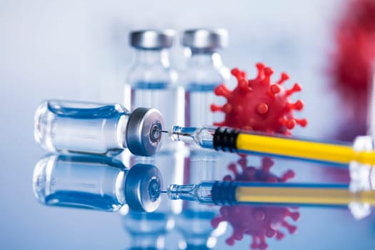Close up medical syringe with a vaccine