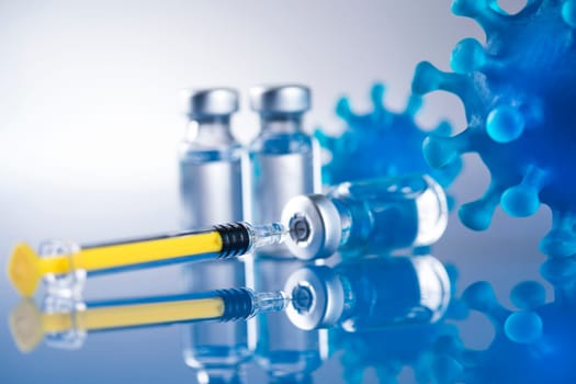 Close up medical syringe with a vaccine