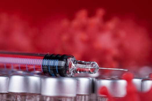 Close up medical syringe with a vaccine