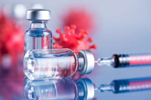 Close up medical syringe with a vaccine