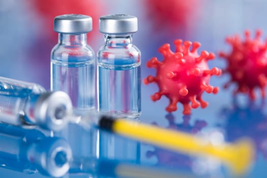 Close up medical syringe with a vaccine