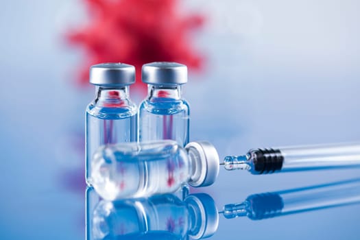Close up medical syringe with a vaccine