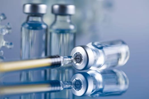 Close up medical syringe with a vaccine