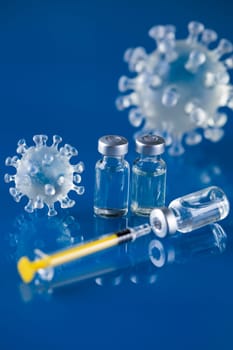 Close up medical syringe with a vaccine